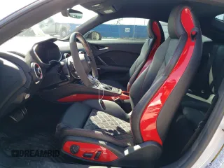 2022 Audi TTS z VIN TRUA1AFV8N1002984, wystawiony jako Copart lot #69760994 z przebiegiem 23 758 mil mil oraz Szkody całkowita. Historia ofert i sprzedaży dostępna na DreamBid. Obrazek 7.