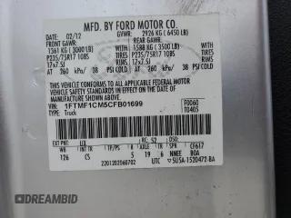 2012 Ford F-150 XL with VIN 1FTMF1CM5CFB01699, listed as a Copart auction lot 42536975 with 129,799 mi miles and Salvage Title. Bid and sale history available at carsss.com. Image 12.