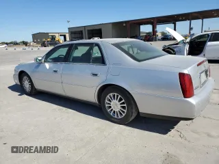 2003 Cadillac DeVille DHS z VIN 1G6KE54Y13U124690, wystawiony jako Copart lot #73757984 z przebiegiem 101 286 mil mil oraz Szkoda całkowita • Salvage title. Historia ofert i sprzedaży dostępna na DreamBid. Obrazek 2.