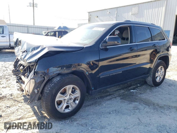 2017 Jeep Grand Cherokee Laredo with VIN 1C4RJEAG4HC952605, listed as a Copart auction lot 56693145 with 115,035 mi miles and Salvage title. Bid and sale history available at DreamBid. Image 1.