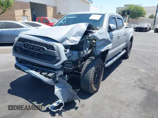 2020 Toyota Tacoma SR5 with VIN 3TMBZ5DN7LM025500, listed as a IAAI auction lot 42651731 with 54,879 mi miles and . Bid and sale history available at DreamBid. Image 18.