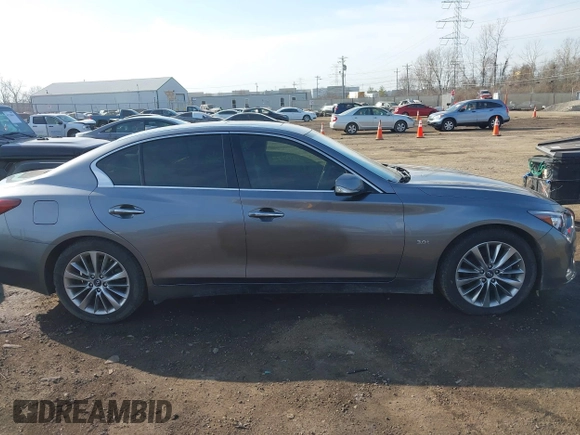 2019 Infiniti Q50 3.0t LUXE with VIN JN1EV7AP7KM513059, listed as a IAAI auction lot 41737122 with 77,337 mi miles. Bid and sale history available at carsss.com. Image 13.