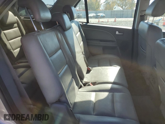 2007 Ford Freestyle SEL z VIN 1FMDK02137GA22864, wystawiony jako Copart lot #73942603 z przebiegiem 134 137 mil mil oraz Szkody całkowita. Historia ofert i sprzedaży dostępna na DreamBid. Obrazek 11.