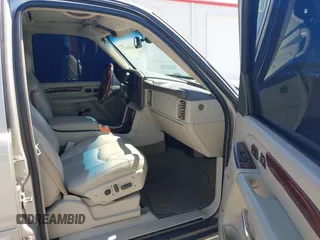 2005 Cadillac Escalade EXT z VIN 3GYEK62NX5G113446, wystawiony jako IAAI lot #41995157 z przebiegiem 173 247 mil mil oraz . Historia ofert i sprzedaży dostępna na DreamBid. Obrazek 5.
