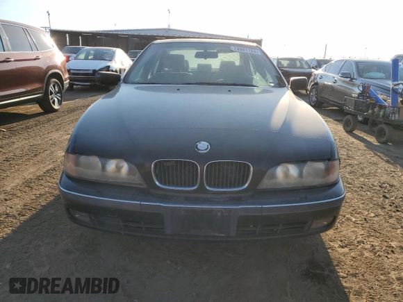 1999 BMW 5 Series 528iA with VIN WBADM634XXGU02243, listed as a Copart auction lot 74981184 with 234,566 mi miles and Salvage Title. Bid and sale history available at carsss.com. Image 5.