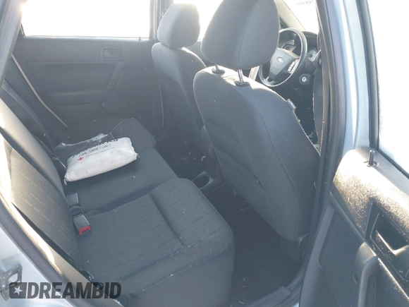 2009 Ford Focus SE z VIN 1FAHP35N79W262568, wystawiony jako IAAI lot #41288346 z przebiegiem 138 902 mil mil oraz . Historia ofert i sprzedaży dostępna na DreamBid. Obrazek 8.
