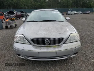 2004 Mercury Sable GS z VIN 1MEFM50U34G601378, wystawiony jako Copart lot #56952825 z przebiegiem 63 456 mil mil oraz Tytuł czysty. Historia ofert i sprzedaży dostępna na DreamBid. Obrazek 5.