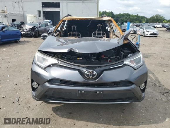 2018 Toyota RAV4 XLE with VIN JTMWFREV2JD125190, listed as a Copart auction lot 60484965 with Not provided miles and Salvage title. Bid and sale history available at DreamBid. Image 5.