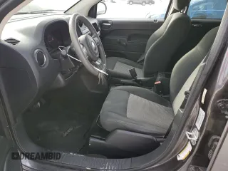 2016 Jeep Compass Sport SE with VIN 1C4NJDBBXGD523537, listed as a Copart auction lot 87664995 with 132,010 mi miles and Salvage title. Bid and sale history available at DreamBid. Image 7.
