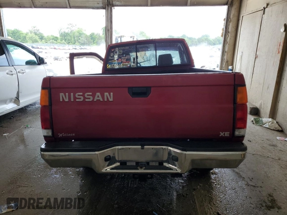 1996 Nissan Frontier XE with VIN 1N6SD16Y7TC354484, listed as a Copart auction lot 59773485 with 109,656 mi miles and Salvage title. Bid and sale history available at DreamBid. Image 6.