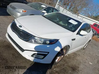 2015 Kia Optima LX z VIN KNAGM4A73F5601370, wystawiony jako IAAI lot #41633083 z przebiegiem 164 752 mil mil oraz . Historia ofert i sprzedaży dostępna na DreamBid. Obrazek 2.