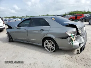 2013 Mercedes-Benz E 350 Luxury with VIN WDDHF5KB2DA692054, listed as a Copart auction lot 62881865 with 210,098 mi miles and Clean title. Bid and sale history available at DreamBid. Image 2.