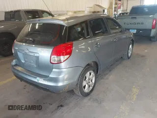 2004 Toyota Matrix Std with VIN 2T1LR32EX4C285993, listed as a IAAI auction lot 41401580 with 216,603 mi miles. Bid and sale history available at carsss.com. Image 4.