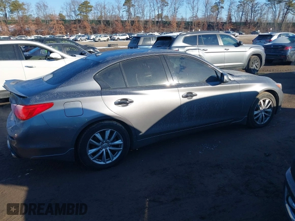 2015 Infiniti Q50 Premium z VIN JN1BV7AR2FM423666, wystawiony jako IAAI lot #41345228 z przebiegiem 67 027 mil mil oraz . Historia ofert i sprzedaży dostępna na DreamBid. Obrazek 13.