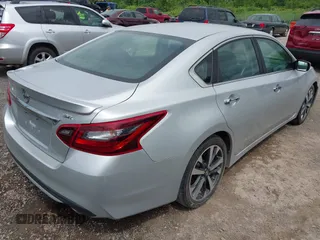 2017 Nissan Altima SV with VIN 1N4AL3AP3HC151424, listed as a IAAI auction lot 42697536 with 157,066 mi miles and . Bid and sale history available at DreamBid. Image 4.