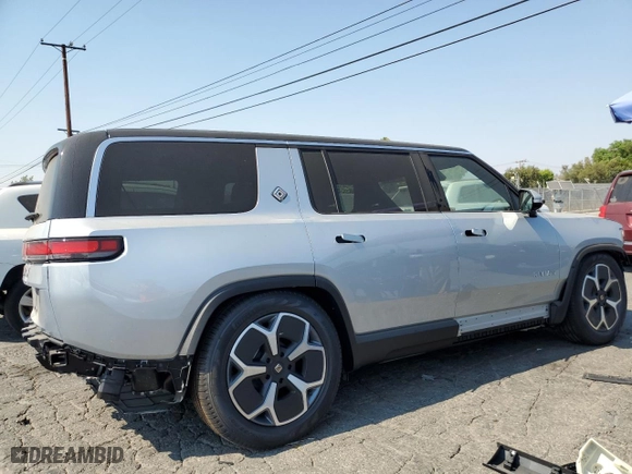 2024 Rivian R1S Adventure with VIN 7PDSGBBA7RN044642, listed as a Copart auction lot 62567904 with 1,888 mi miles and Salvage Title. Bid and sale history available at carsss.com. Image 3.