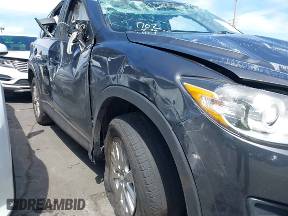 2016 Mazda CX-5 Touring with VIN JM3KE2CY6G0832967, listed as a IAAI auction lot 41943527 with 1 mi miles. Bid and sale history available at carsss.com. Image 21.