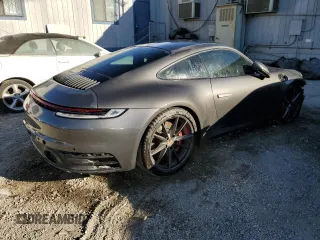 2024 Porsche 911 Carrera S with VIN WP0AB2A9XRS218472, listed as a Copart auction lot 76996354 with 1,155 mi miles and Salvage Title. Bid and sale history available at carsss.com. Image 3.