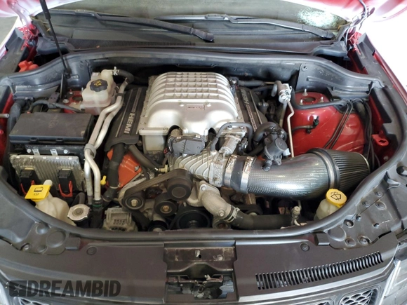2019 Jeep Grand Cherokee Trackhawk with VIN 1C4RJFN92KC564748, listed as a Copart auction lot 82677504 with 48,528 mi miles and Salvage title. Bid and sale history available at DreamBid. Image 12.