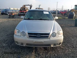 2004 Kia Optima LX z VIN KNAGD126045302372, wystawiony jako IAAI lot #41022315 z przebiegiem 199 588 mil mil oraz . Historia ofert i sprzedaży dostępna na DreamBid. Obrazek 13.