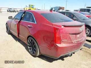 2013 Cadillac ATS Performance z VIN 1G6AC5S30D0128358, wystawiony jako IAAI lot #41745457 z przebiegiem 99 977 mil mil oraz . Historia ofert i sprzedaży dostępna na DreamBid. Obrazek 3.
