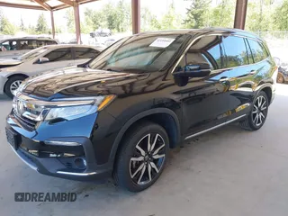 2021 Honda Pilot Touring 8-Passenger z VIN 5FNYF6H99MB049728, wystawiony jako IAAI lot #42194602 z przebiegiem 41 374 mil mil oraz . Historia ofert i sprzedaży dostępna na DreamBid. Obrazek 18.