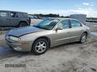2001 Oldsmobile Aurora z VIN 1G3GR64H914122292, wystawiony jako Copart lot #75867154 z przebiegiem 120 977 mil mil oraz Szkody całkowita. Historia ofert i sprzedaży dostępna na DreamBid. Obrazek 1.