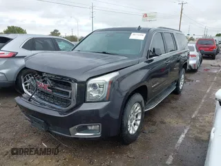 2015 GMC Yukon XL SLT with VIN 1GKS1HKC8FR219289, listed as a IAAI auction lot 40772496 with 163,477 mi miles. Bid and sale history available at carsss.com. Image 18.