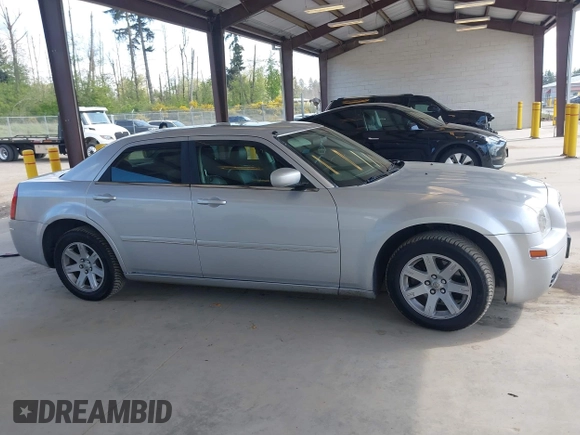 2005 Chrysler 300 Touring with VIN 2C3JA53G75H687752, listed as a IAAI auction lot 42190758 with 170,269 mi miles and . Bid and sale history available at DreamBid. Image 13.