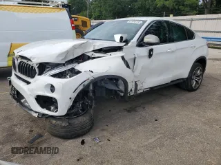 2019 BMW X6 xDrive35i with VIN 5UXKU2C52K0Z64195, listed as a Copart auction lot 57059124 with 79,017 mi miles and Salvage Title. Bid and sale history available at carsss.com. Image 1.
