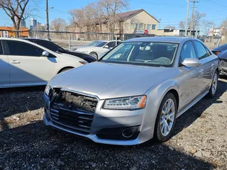 2017 Audi A8 with VIN WAUK3AFD2HN009732, listed as a Copart auction lot 49716235 with 125,257 mi miles and Salvage title. Bid and sale history available at DreamBid. Image 1.