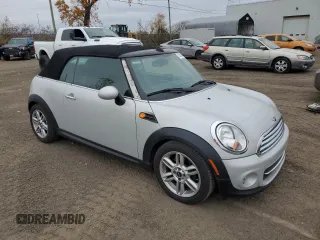 2012 MINI Convertible with VIN WMWZN3C57CT135185, listed as a Copart auction lot 78580644 with 83,027 mi miles and Salvage Title. Bid and sale history available at DreamBid. Image 4.