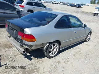 1998 Honda Civic DX with VIN 1HGEJ6123WL130983, listed as a IAAI auction lot 41836867 with 290,461 mi miles. Bid and sale history available at carsss.com. Image 4.