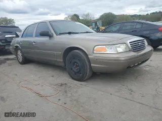 2005 Ford Crown Victoria LX with VIN 2FAFP74W95X147431, listed as a Copart auction lot 73487374 with 203,107 mi miles and Non Repairable. Bid and sale history available at carsss.com. Image 4.