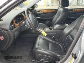 2007 Jaguar XJ with VIN SAJWA71B17SH14626, listed as a Copart auction lot 71013573 with 156,134 mi miles and Salvage Title. Bid and sale history available at carsss.com. Image 7.