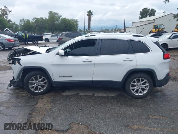 2015 Jeep Cherokee Latitude with VIN 1C4PJMCB1FW751758, listed as a IAAI auction lot 41767154 with 160,349 mi miles. Bid and sale history available at carsss.com. Image 14.