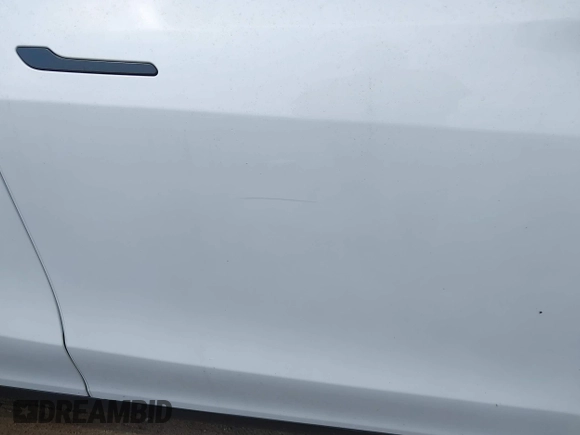 2023 Tesla Model Y Long Range with VIN 7SAYGAEEXPF776370, listed as a IAAI auction lot 42127512 with 27,120 mi miles and . Bid and sale history available at DreamBid. Image 22.