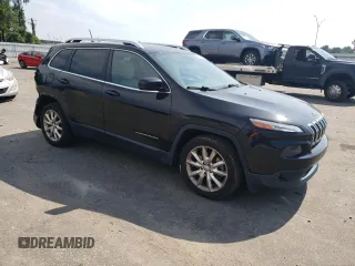 2016 Jeep Cherokee Limited with VIN 1C4PJLDB0GW136788, listed as a Copart auction lot 69684644 with 126,039 mi miles and Salvage title. Bid and sale history available at DreamBid. Image 4.