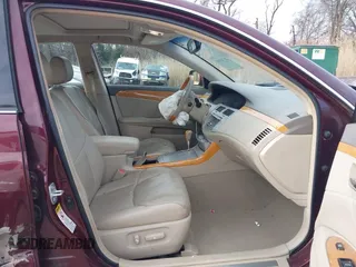 2007 Toyota Avalon XL with VIN 4T1BK36B37U173085, listed as a IAAI auction lot 41748541 with 164,021 mi miles. Bid and sale history available at carsss.com. Image 5.