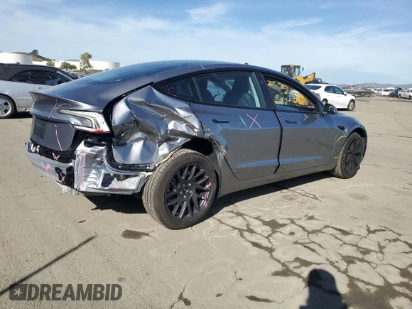2025 Tesla Model 3 Long Range with VIN 5YJ3E1EA8SF890337, listed as a Copart auction lot 45023425 with 1,765 mi miles and Salvage Title. Bid and sale history available at DreamBid. Image 3.