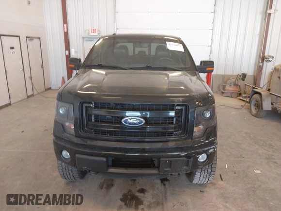 2013 Ford F-150 XL z VIN 1FTFW1ETXDFA63062, wystawiony jako IAAI lot #42370055 z przebiegiem 209 750 mil mil oraz . Historia ofert i sprzedaży dostępna na DreamBid. Obrazek 13.