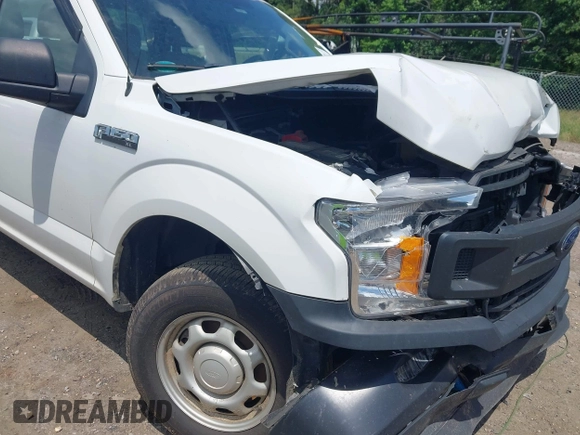 2018 Ford F-150 XL with VIN 1FTEX1CB5JFE55932, listed as a IAAI auction lot 42298917 with 143,923 mi miles and . Bid and sale history available at DreamBid. Image 6.