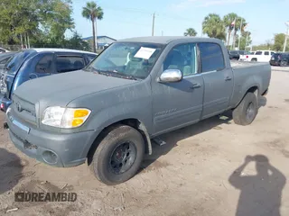 2004 Toyota Tundra SR5 with VIN 5TBET34114S436871, listed as a IAAI auction lot 41735558 with 240,899 mi miles. Bid and sale history available at carsss.com. Image 2.