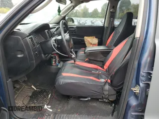 2003 Dodge Dakota Sport with VIN 1D7HL38N63S192308, listed as a Copart auction lot 77494684 with 128,512 mi miles and Salvage Title. Bid and sale history available at carsss.com. Image 7.