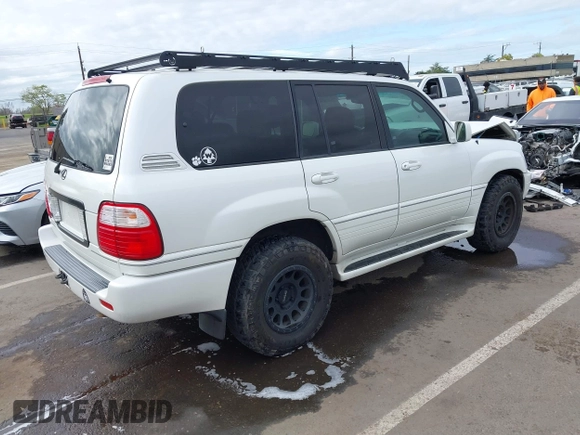 2004 Lexus LX 470 z VIN JTJHT00W043543915, wystawiony jako IAAI lot #41902858 z przebiegiem 110 454 mil mil oraz . Historia ofert i sprzedaży dostępna na DreamBid. Obrazek 4.