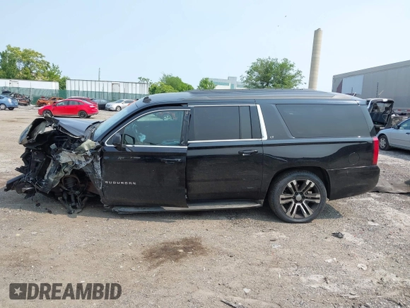 2015 Chevrolet Suburban LT with VIN 1GNSKJKC4FR222178, listed as a IAAI auction lot 42423080 with 234,870 mi miles and . Bid and sale history available at DreamBid. Image 14.