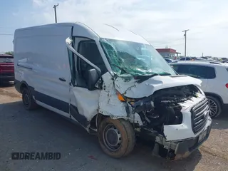 2016 Ford Transit Cargo z VIN 1FTYR2CM6GKA55411, wystawiony jako IAAI lot #42582896 z przebiegiem 89 921 mil mil oraz . Historia ofert i sprzedaży dostępna na DreamBid. Obrazek 1.