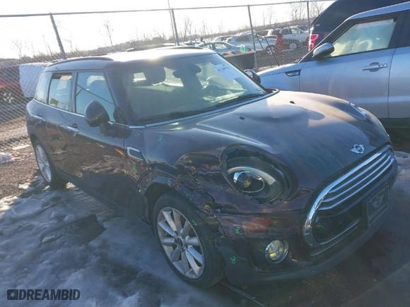 2016 MINI Cooper Clubman with VIN WMWLN5C50G2E29740, listed as a IAAI auction lot 41345976 with 67,124 mi miles. Bid and sale history available at carsss.com. Image 1.