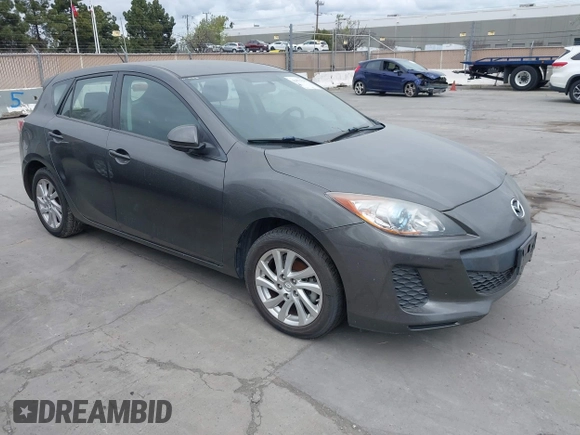 2012 Mazda Mazda3 i Touring with VIN JM1BL1L82C1696088, listed as a IAAI auction lot 41872228 with 111,629 mi miles. Bid and sale history available at carsss.com. Image 1.