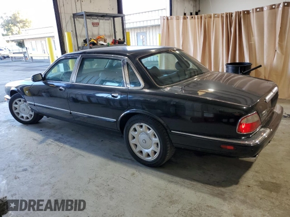 2001 Jaguar XJ with VIN SAJDA25B01MF26440, listed as a Copart auction lot 83933224 with 124,873 mi miles and Clean Title. Bid and sale history available at DreamBid. Image 2.